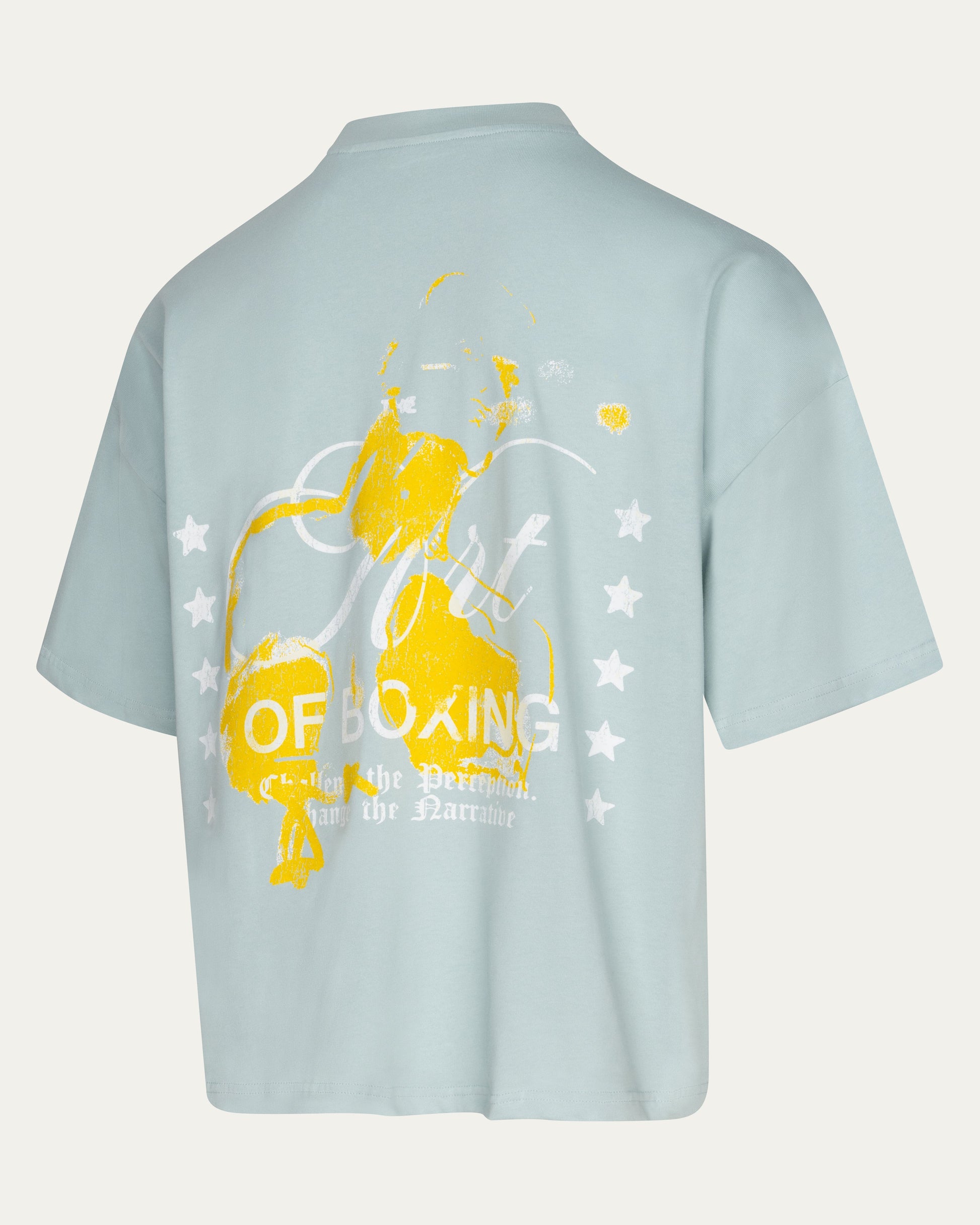 Light blue t-shirt with yellow boxing graphic and text on a light gray background