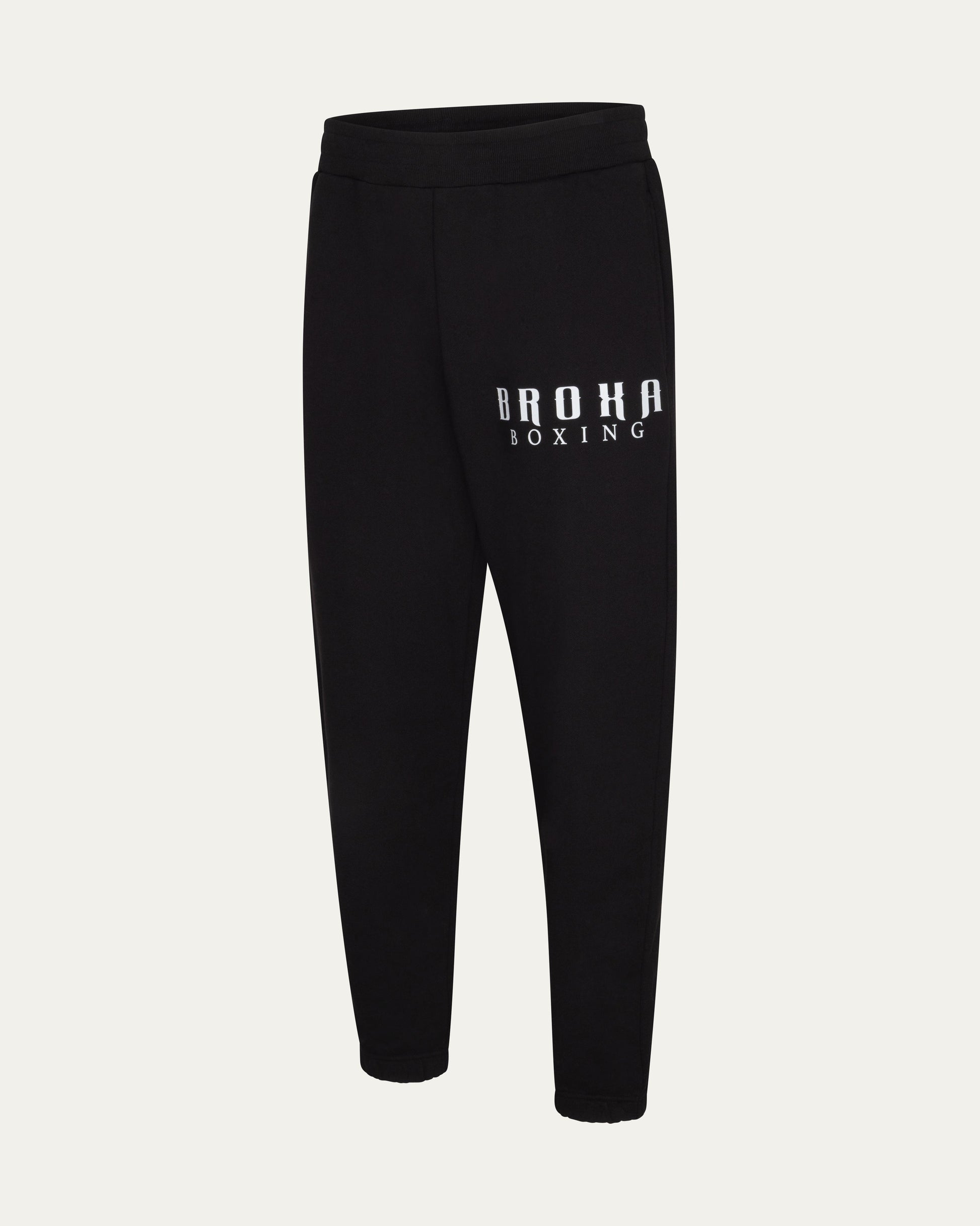 Black sweatpants with 'BROHA BOXING' text on a light gray background