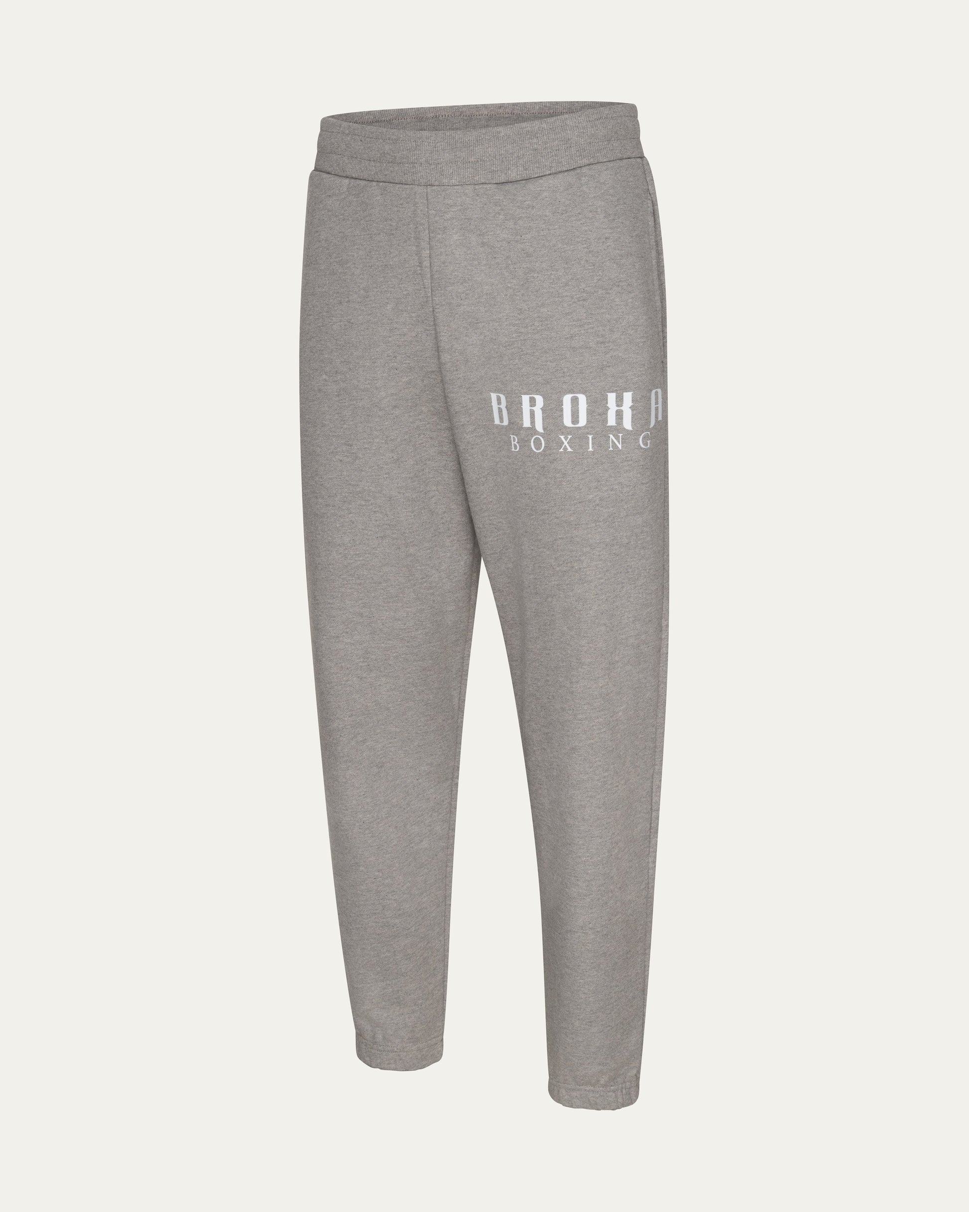 Gray sweatpants with 'Brooks Boxing' logo on a light gray background